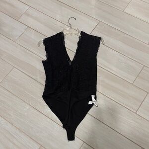 Chic Black Lace Bodysuit with Bow Accent
